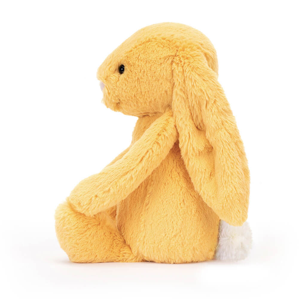 Lapin en Peluche Timide au Soleil