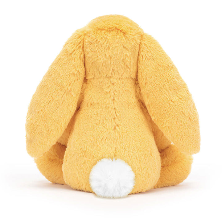 Lapin en Peluche Timide au Soleil