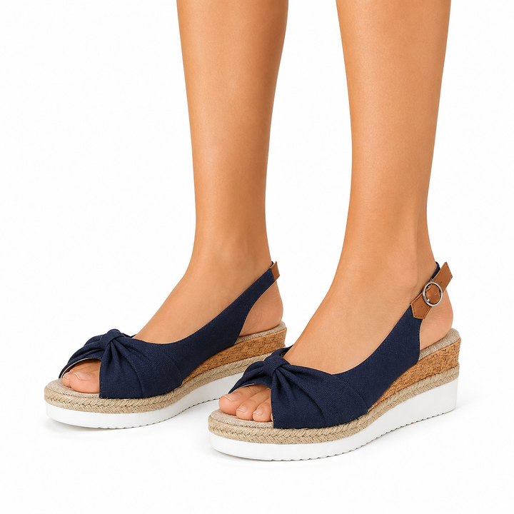 Sandales compensées décontractées pour femmes" can be rewritten as "Sandales à talons compensés décontractées pour femmes.